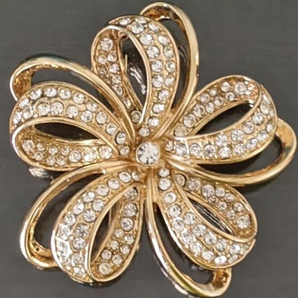Gold & Rhinestone flower bow brooch by Monet